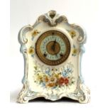 A Royal Bonn ceramic mantel clock with floral decoration, with Ansonia movement, 26.5cmH