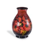 A Moorcroft orchid pattern baluster vase second quarter 20th century decorated in shades of red