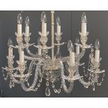 An 11 arm glass Adam style chandelier