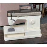 A Singer 7102 sewing machine in soft case