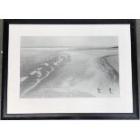 A large black and white photograph of a beach scene, 50x78cm