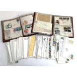 A quantity of Post Office first day covers in 2 albums and loose