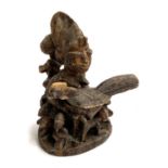 A Nigerian Yoruba cup holder fertility figure, 36cmH