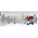 A large quantity of cut and other glass to include finger bowls, small wine decanters, cameos,