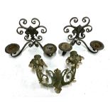 A pair of wrought iron two arm wall sconces with central fleur de lis and scrolling design, 23.5cmW;