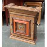 A 20th century pine wall cabinet, moulded pediment and moulded door inscribed 1722 Elias JP,