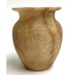 A small turned Egyptian alabaster vase, 12cmH