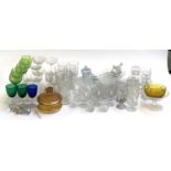 A large mixed lot of glassware to include coloured hock glasses, champagne cups, various cut