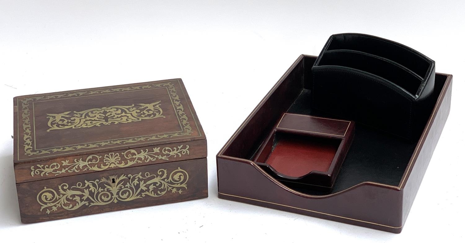 A Regency rosewood and brass inlaid writing box (af); together with three leather clad desk items (