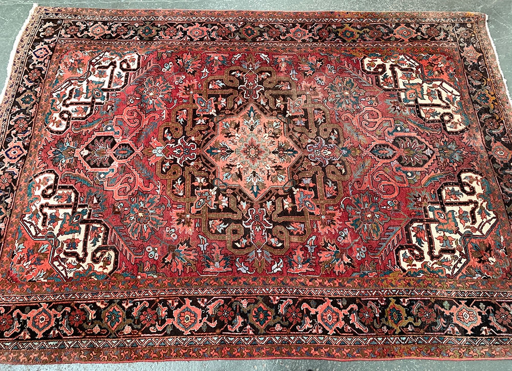 A large West Persian rug with central medallion, 340x235cm