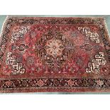 A large West Persian rug with central medallion, 340x235cm