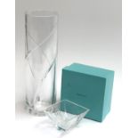 A Tiffany & Co. glass vase 35cmH, together with a Tiffany & Co. square glass bonbon dish, 11cm