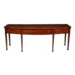 A George III mahogany sideboard, late 18th century, three drawers, on square section legs 86cm high,