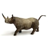 A Coalport figurine of a rhinoceros, 16cmH