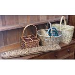 A quantity of baskets to include a wicker four bottle wine holder
