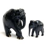 Two hardwood carved African elephants, the largest 20cmH