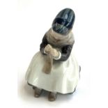 A Royal Copenhagen figurine, Amager girl knitting no. 1314