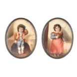 A pair of German porcelain oval plaques of children in folk dress, late 19th century, mounted in