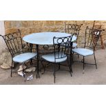 A set of 4 wrought iron garden chairs with painted wooden seats, with a matching circular table,