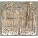A pair of decorative domed mirrors with lattice decoration, both 102x53cm