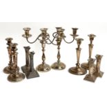 A pair of three arm plated candlesticks, 35cmH, together with 4 other pairs of plated candlesticks