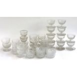 A large quantity of cut glassware, mostly trifle dishes and 10 cut glass finger bowls, some with