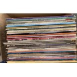 A mixed box of vinyl LPs mainly 1970s to include The Bay City Rollers, The Dooleys, Andy Williams