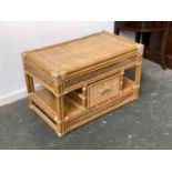 A bamboo and cane coffee table with single drawer below, 76x44x47cm