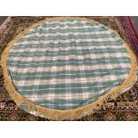 A lined circular plaid tablecloth, with fringe, approx. 220cmD