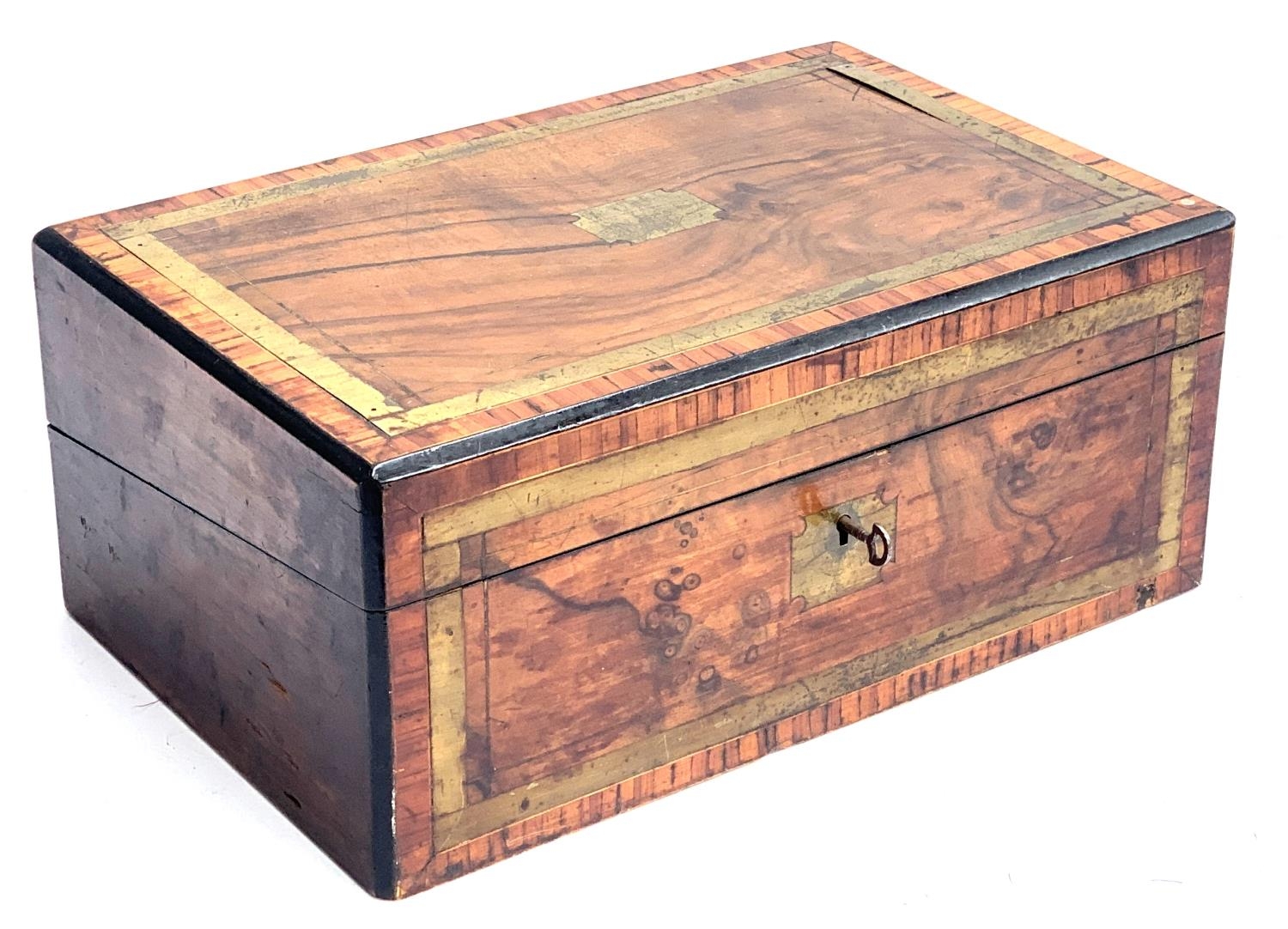 A 19th century walnut and brass bound writing box, fitted interior with key and inkwells present,