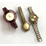 Three ladies watches: a lucite Gucci bracelet watch, together with a Seiko day date quartz, and a