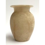 A turned Egyptian alabaster vase, 17cmH