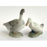 Two Royal Copenhagen figurines, grey goose no. 1088, duck no. 1192