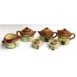 Four Burlington ware Devon Cobb cottage teapots and pot with handle, together with 2 Paramount