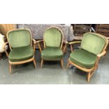 A pair of Ercol stickback armchairs, together with one other, the pair 68cmW, the other hoopback