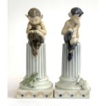 Two Royal Copenhagen figurines, 'Faun with Lizard' no. 433 and 'Faun with Rabbit' no. 456, each