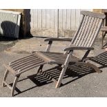 A teak garden lounger; together with one other metal and mesh lounger