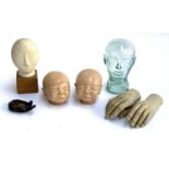 Anatomical interest: A mixed lot to include medical rubber baby head models, one stamped R.A.D vacc,