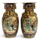 A pair of large Japanese vases depicting Geishas, heightened in gilt with textured enamel