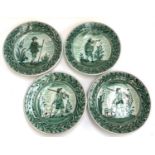 Interior design interest: a set of four Italian green majolica chargers depicting continental men in