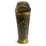 A brass stick stand decorated with tavern scene