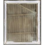 A rectangular mirror with bevelled glass, 57x47cm