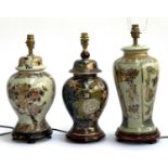 Three Chinese ceramic table lamps on hardwood stands, heightened in gilt, the tallest 44cmH to top