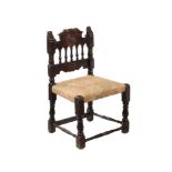 A Dutch beech low side chair, late 17th century and later, possibly Colonial, 77cmH