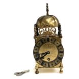 A 20th century brass cased replica lantern clock by Smiths, 7 jewel movement, 24cmH