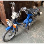 A Honda NC50 Express moped, showing 3300 miles, engine turns over