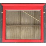 A red painted wall mirror, with moulded pediment and bevelled glass, 58x54cm