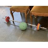 A Sveltus 7kg barbell; together with a weighted exercise ball