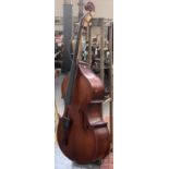 A very large double bass, in need of some restoration, , bears label 'Stradivari Copy Universal
