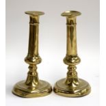 A good pair of 19th century brass candlesticks, with ejector mechanism, 24cmH